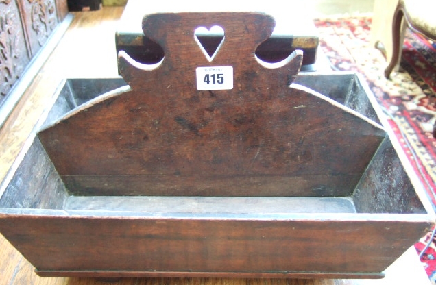 Appraisal: An th century mahogany two division cutlery box the handle