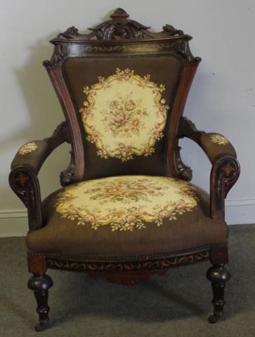 Appraisal: Victorian Carved Needlepoint Upholstered ArmChair One of the better makers