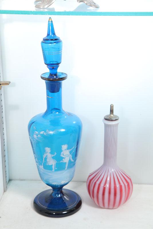 Appraisal: TWO PIECES OF GLASS Blue Mary Gregory decanter with children