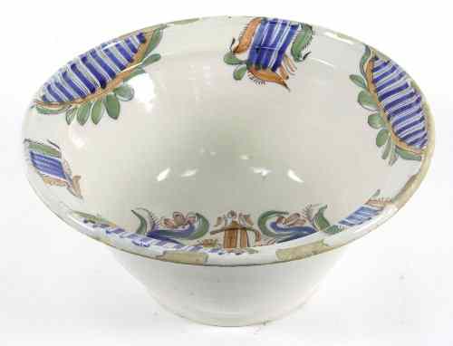 Appraisal: A French tin glaze bowl of faience design decorated stylised