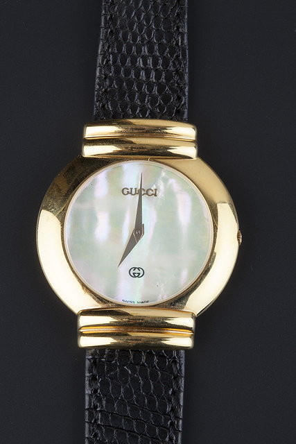 Appraisal: A lady's wristwatch by Gucci the circular signed mother of