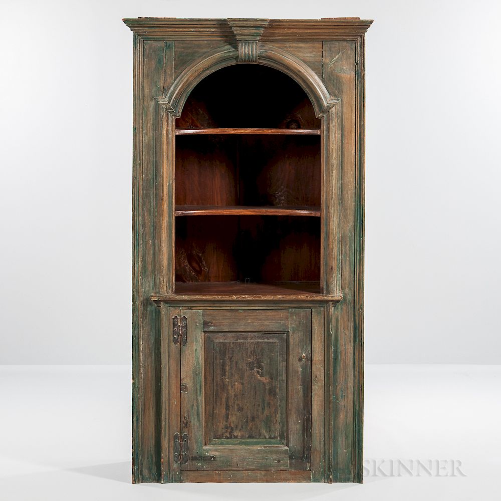 Appraisal: Green-painted Cupboard Green-painted Cupboard th century with molded surround an