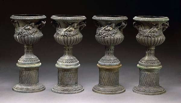 Appraisal: A set of four Belle poque style patinated bronze garden