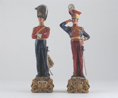 Appraisal: Two Italian porcelain models of soldiers by Bruno Merli one