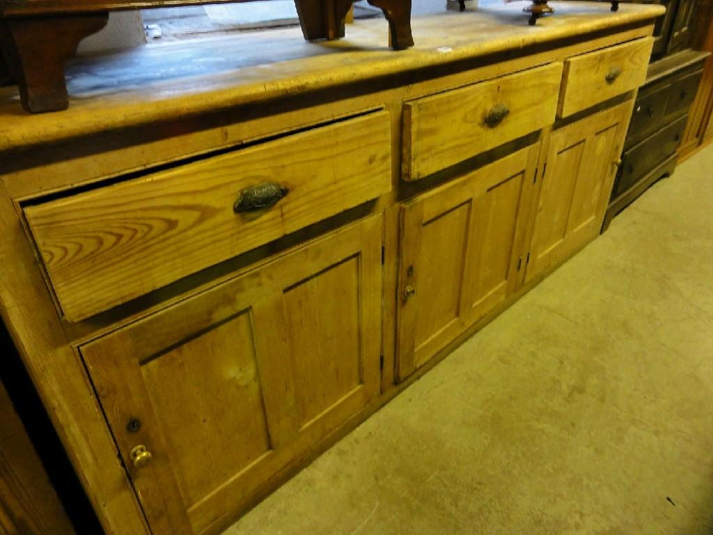 Appraisal: A small reproduction open bookcase in the Georgian style fitted