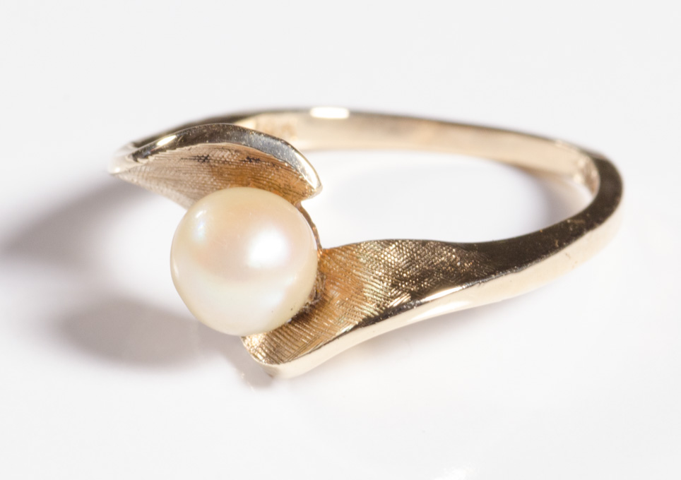 Appraisal: PEARL AND TEN KARAT GOLD RING set with a single