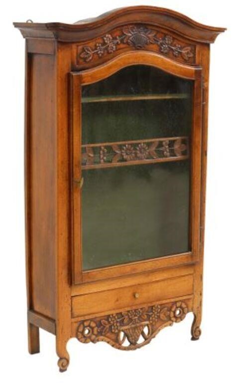 Appraisal: French Provincial Louis XV style walnut wall-mounted vitrine display case