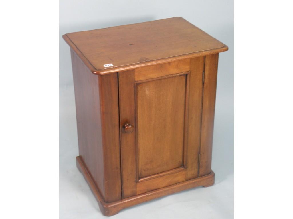 Appraisal: A Victorian mahogany bedside cabinet the rectangular top with a