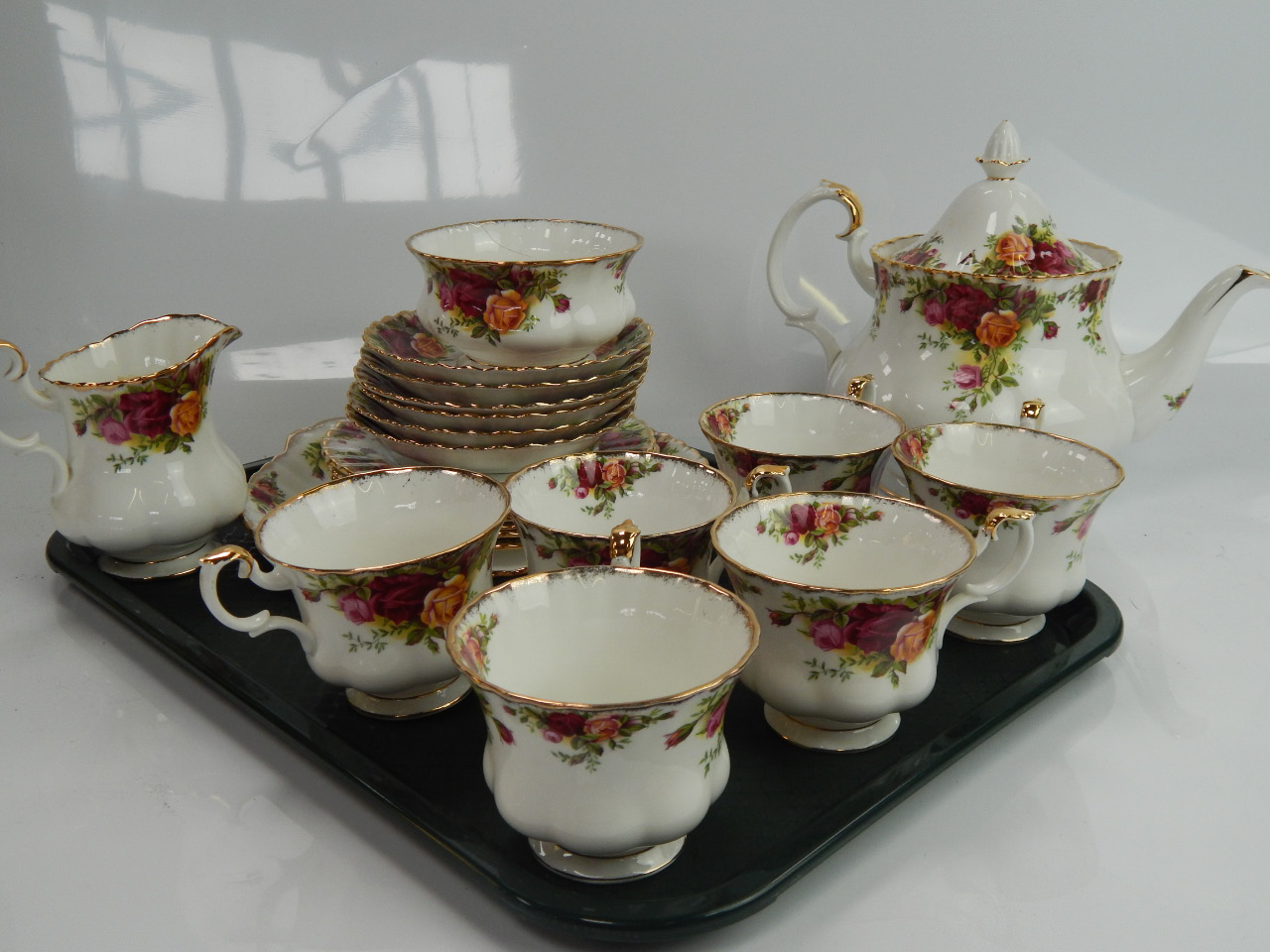 Appraisal: A Royal Albert Old Country Roses tea service including teapot