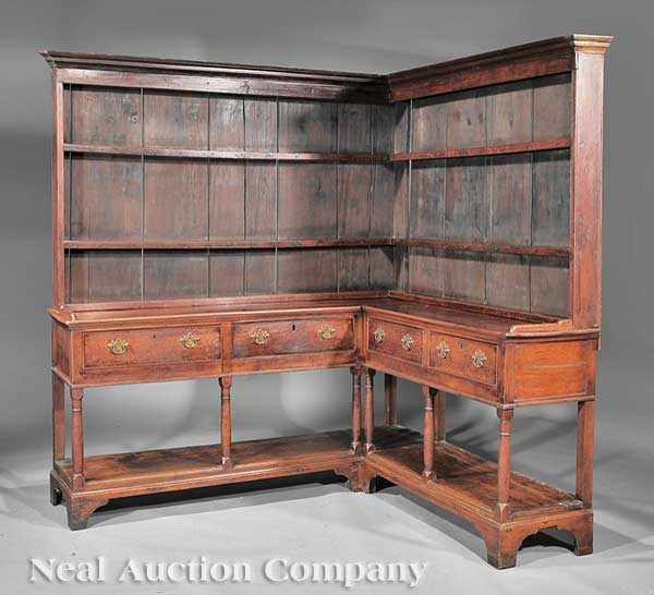 Appraisal: A George III Carved Oak Corner Welsh Dresser late th