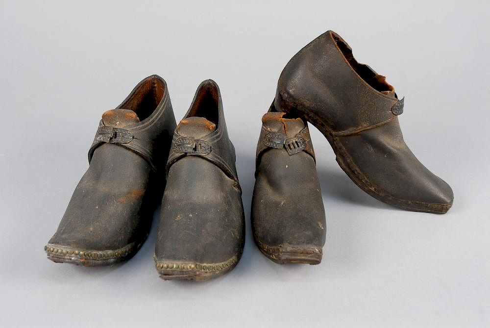 Appraisal: TWO PAIR MINER or MILLWORKER CLOGS MID th C Black