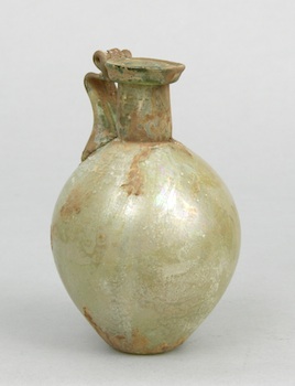 Appraisal: A Mediterranean Glass Handled Jug Clear glass with green gold