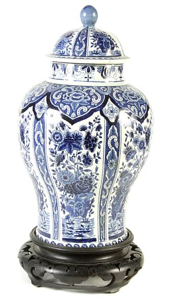 Appraisal: A pair of Delft blue and white vases height in