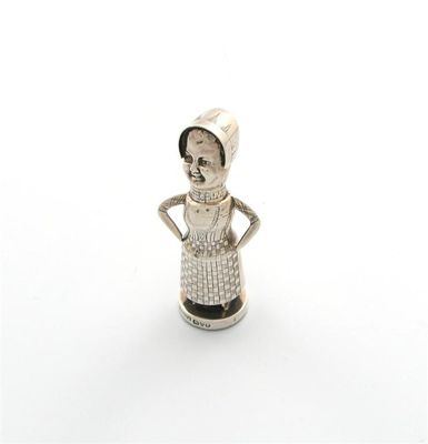 Appraisal: An Edwardian silver novelty Dutch lady pepper pot by Saunders