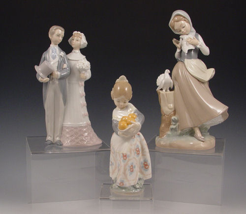 Appraisal: LLADRO FIGURES GIRL WITH PIGEONS retire in '' tall sold