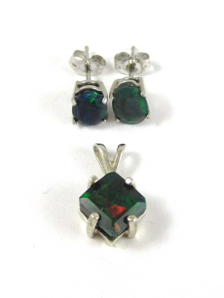 Appraisal: THREE ARTICLES OF BLACK OPAL JEWELRY including a pair of