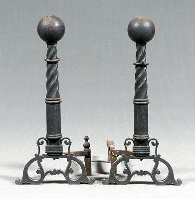 Appraisal: Pair iron andirons each with cannonball top spiral column and