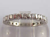 Appraisal: An untested white metal diamond eternity ring estimated total diamond