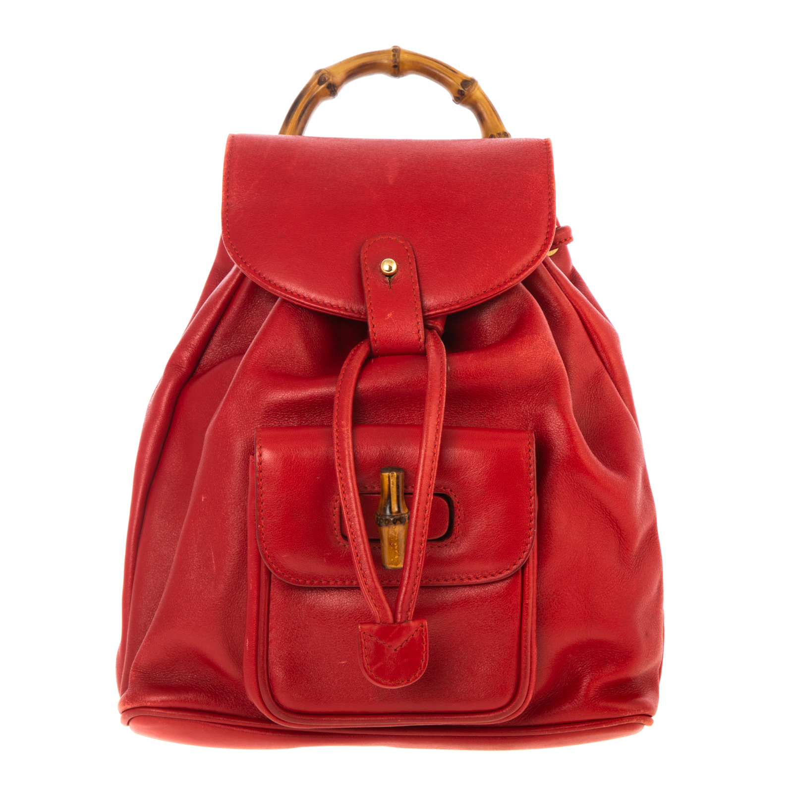 Appraisal: A GUCCI BAMBOO BACKPACK A red leather Gucci Bamboo backpack