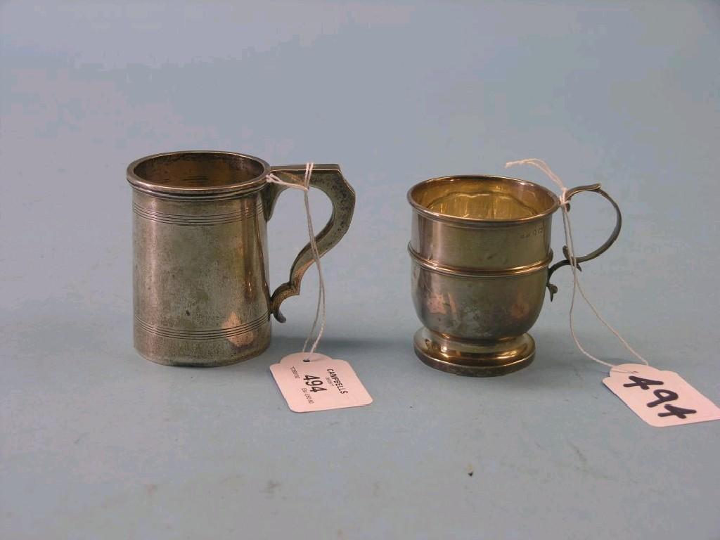 Appraisal: Two silver christening mugs Birmingham and approx oz total