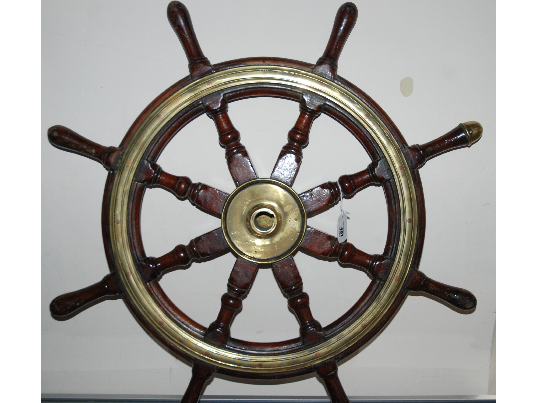 Appraisal: A Victorian mahogany and brass bound ships wheel