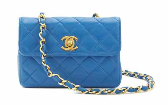 Appraisal: A Chanel Turquoise Quilted Leather Bag goldtone logo closure and