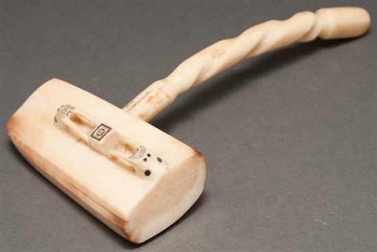 Appraisal: Inuit carved walrus ivory mallet in L