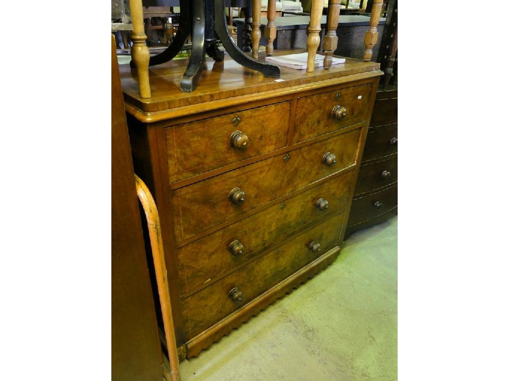 Appraisal: A Victorian walnut and figured walnut veneered chest fitted with