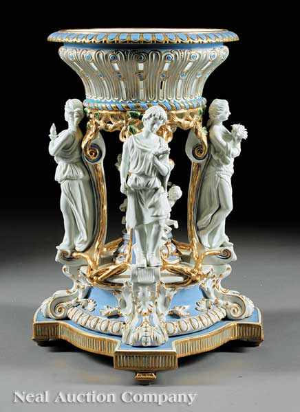 Appraisal: A Monumental Gilt Porcelain Figural Centerpiece modeled and painted in