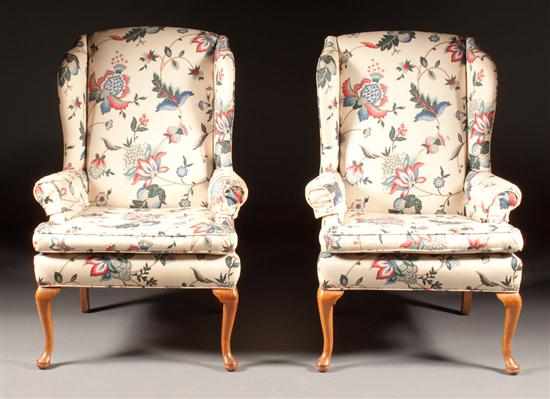 Appraisal: Pair of Queen Anne style carved oak upholstered wing chairs