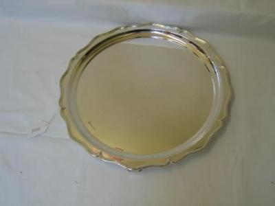 Appraisal: A SALVER of circular form with shaped moulded rim three