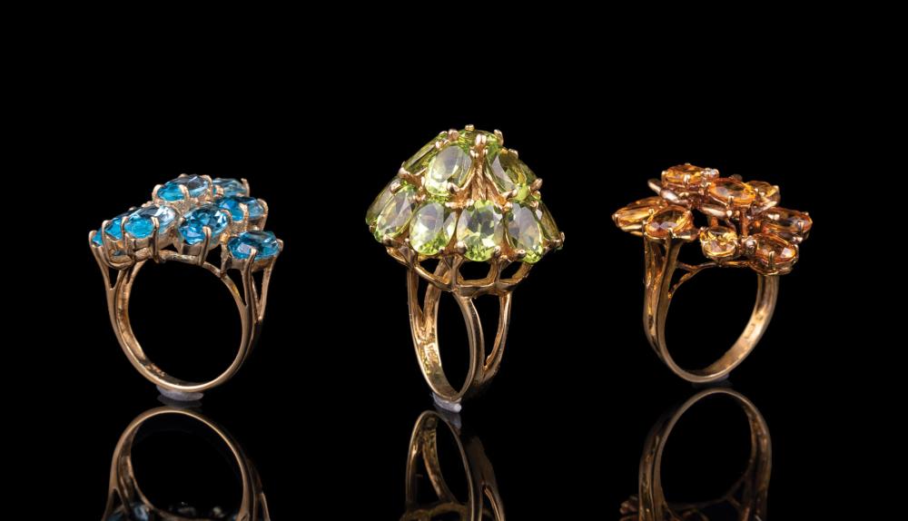 Appraisal: Three Yellow Gold and Gemset Cluster Rings incl blue topaz