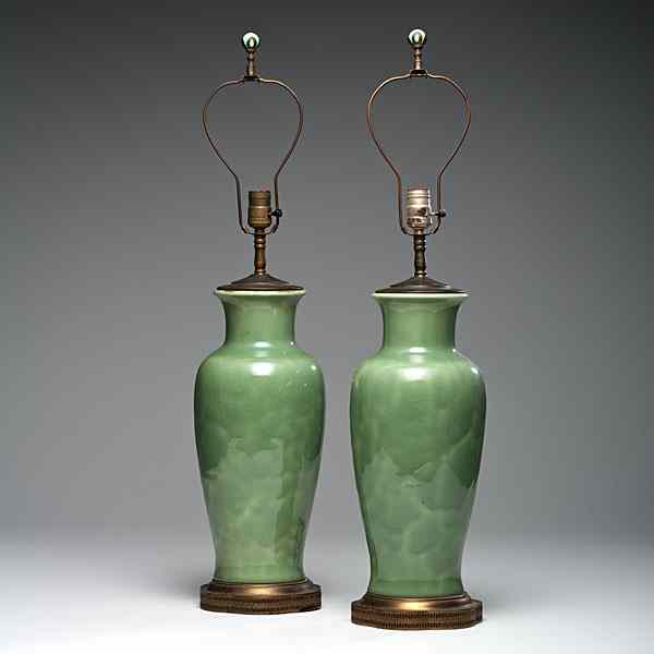 Appraisal: Pair Rookwood Lamps American Pair of Rookwood pottery lamps in