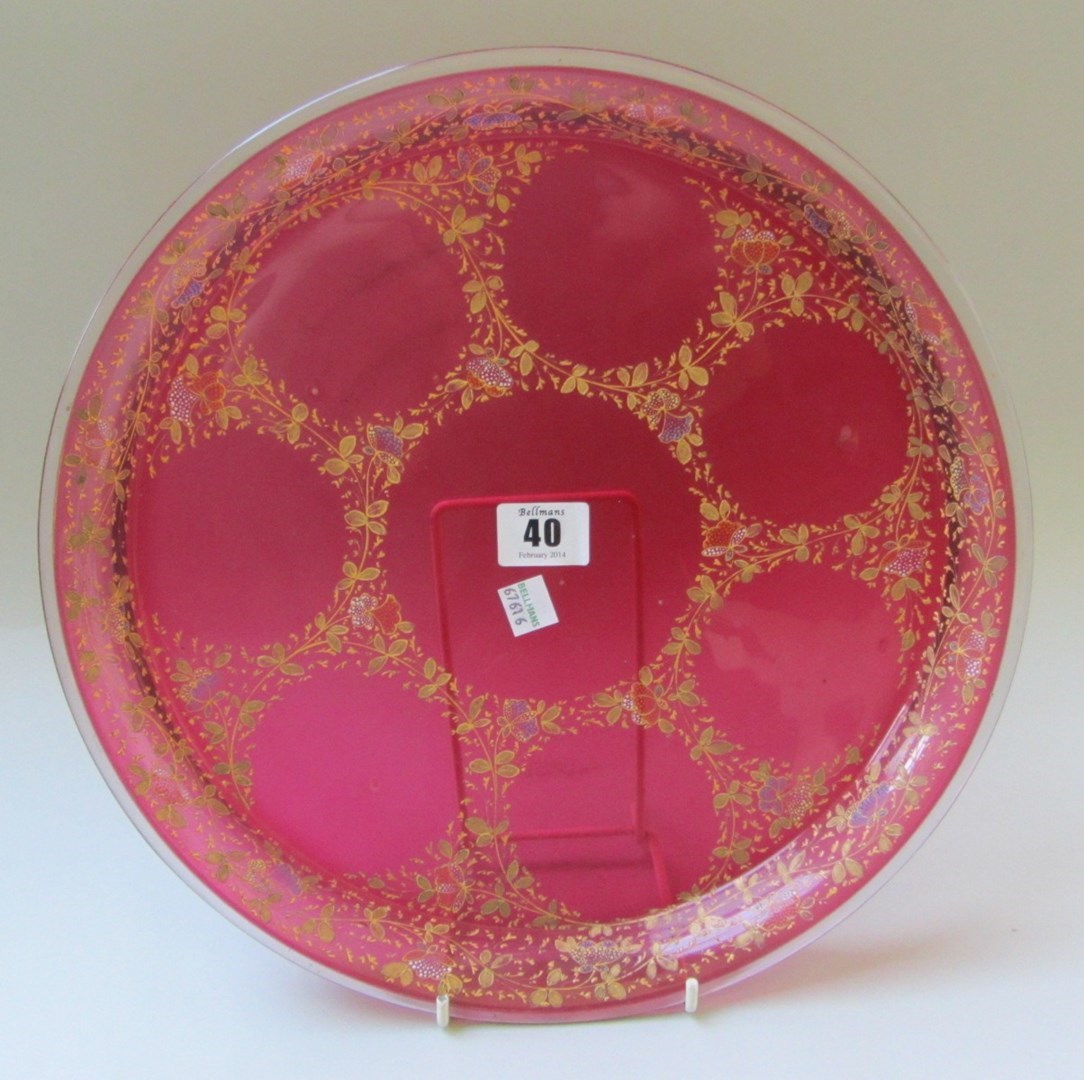 Appraisal: A cranberry glass circular serving tray early th century gilt