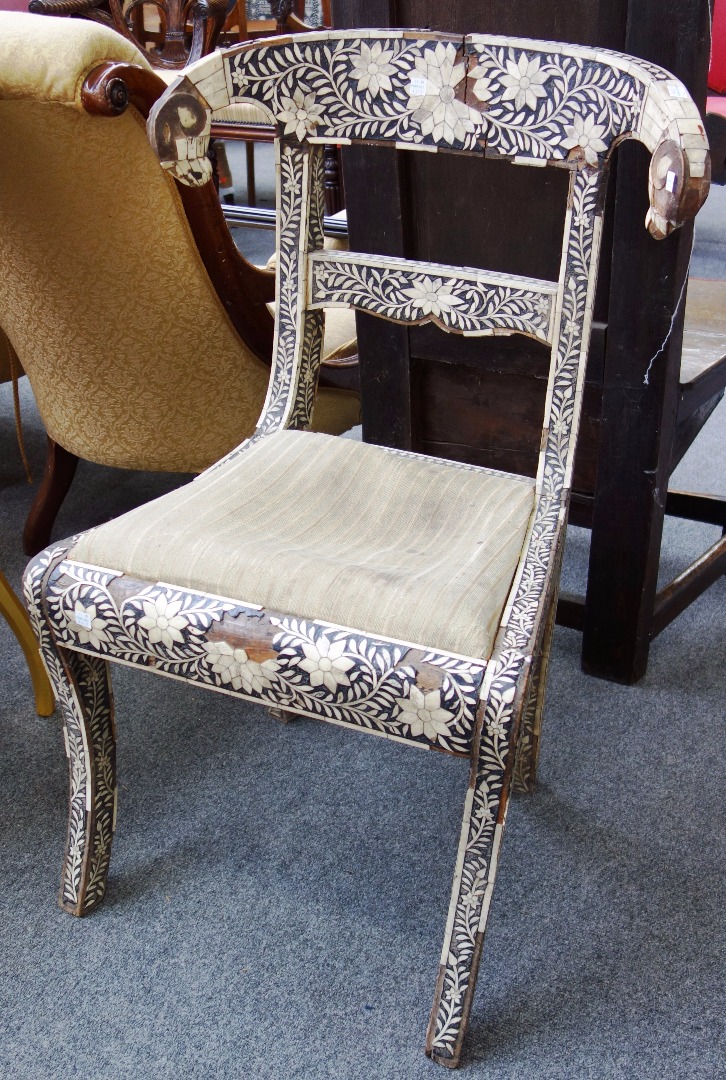 Appraisal: A th century marquetry bone inlaid single chair on sabre