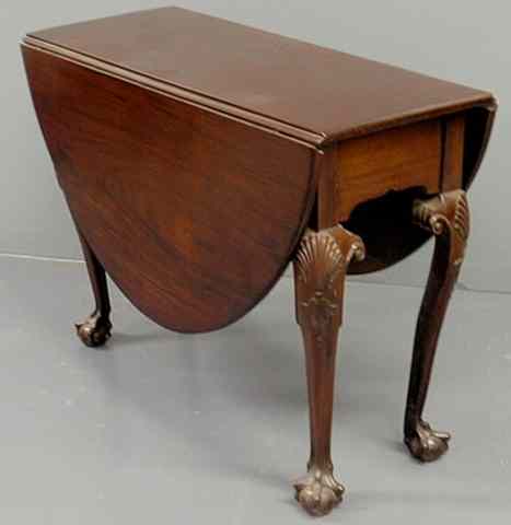 Appraisal: Anglo Irish Chippendale mahogany drop-leaf table c with shell carved