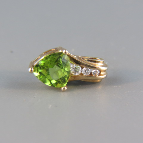 Appraisal: Peridot and Diamond Pendant vivid triangular gem with a trio