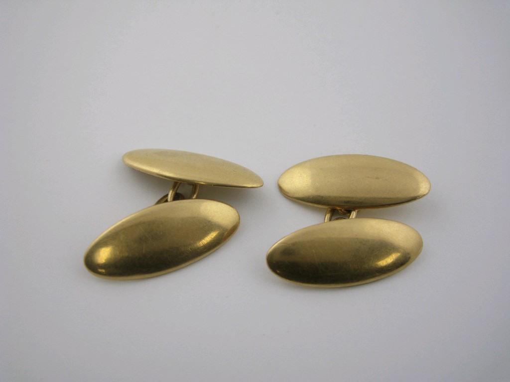 Appraisal: A pair of ct gold domed oval Cufflinks approx gms