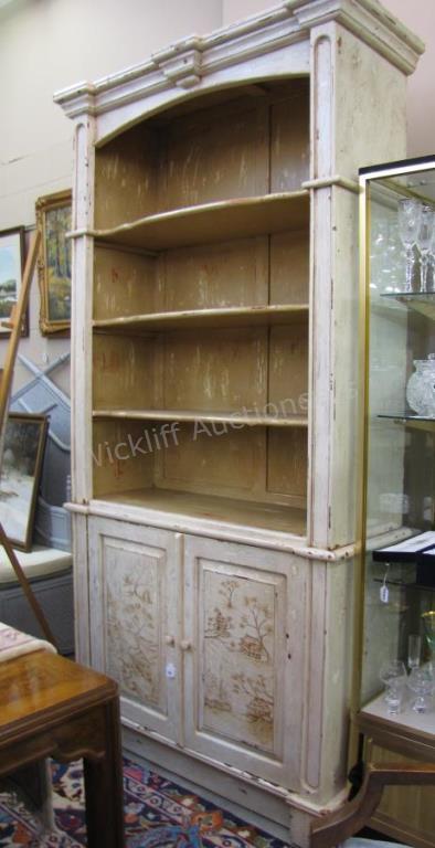 Appraisal: A 'Shabby Chic style bookcase with cupboard base having doors