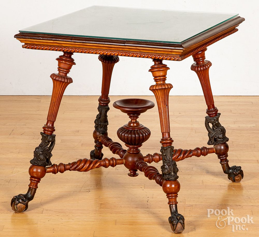 Appraisal: Victorian mahogany center table with cast brass Victorian mahogany center