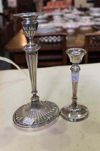 Appraisal: A GEORGIAN STYLE SILVER CANDLESTICK with tapering stylised column and