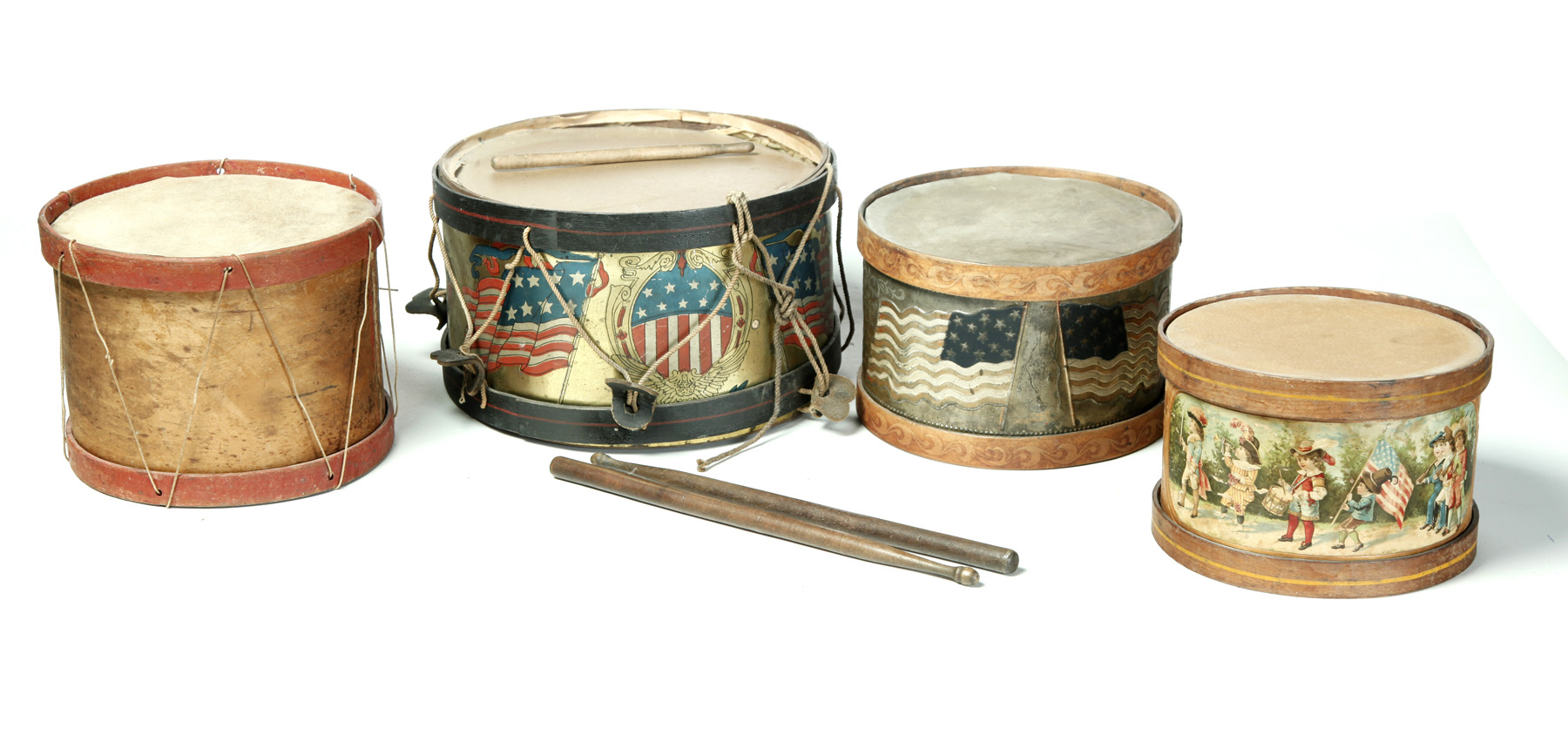 Appraisal: FOUR CHILDREN'S TOY DRUMS Late th-early th century Two in