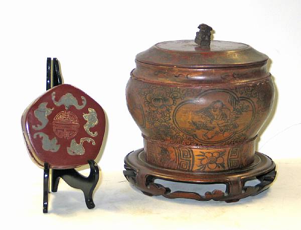 Appraisal: Two lacquered containers Including a covered bin decorated with gilt