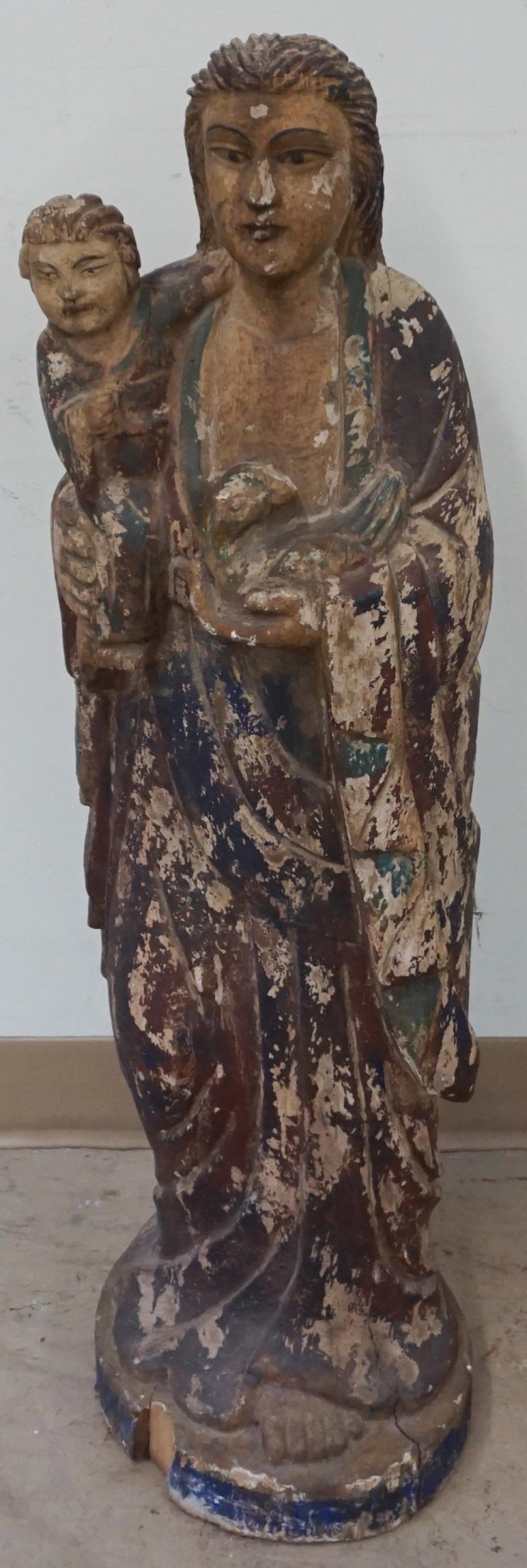 Appraisal: CHINESE PAINTED WOOD FIGURE OF GUANYIN WITH DOVE AND CHILD