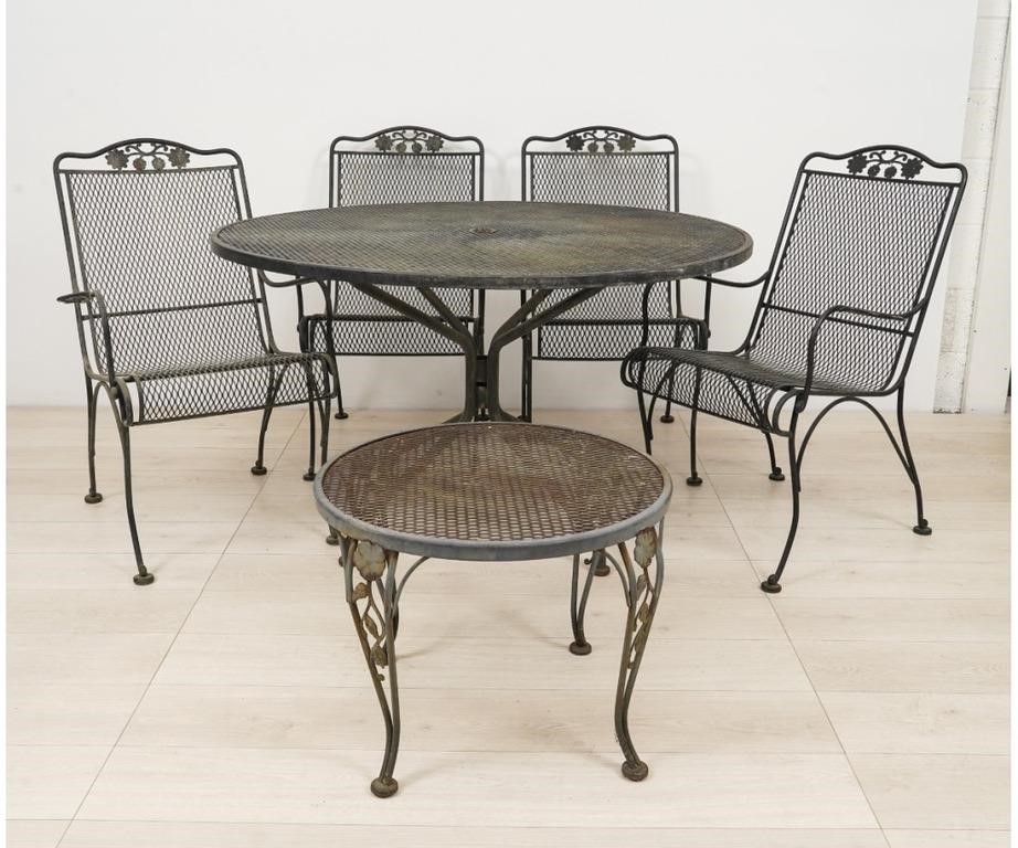 Appraisal: Woodard wrought iron patio set to include a round table