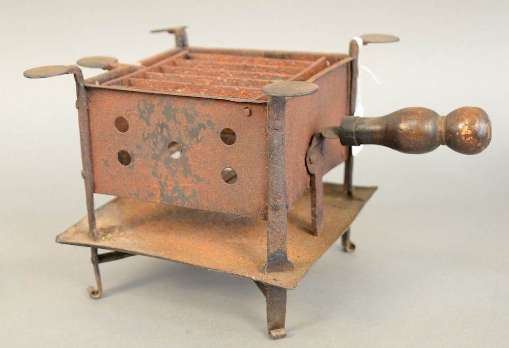 Appraisal: Wrought iron revolutionary war camp stove with wood handle ht