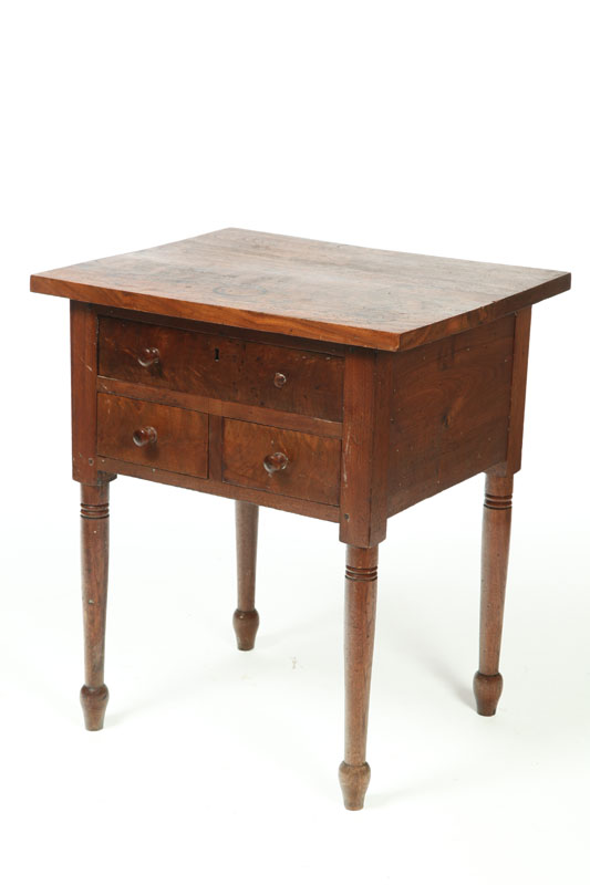 Appraisal: COUNTRY STAND Probably Midwestern th century walnut with figured or