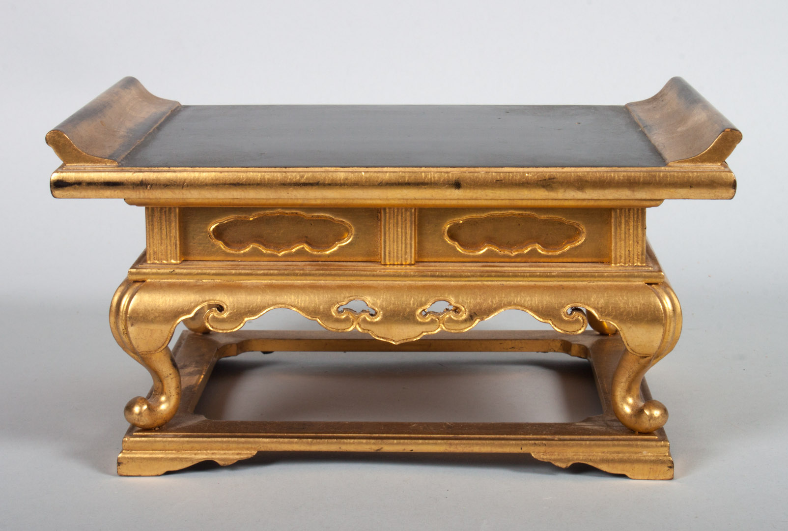 Appraisal: Japanese gilt lacquered miniature altar table in H in W