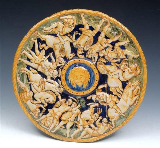 Appraisal: AN ITALIAN MAIOLICA TAZZA decorated to the centre with lion's