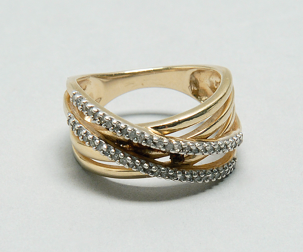 Appraisal: GOLD-WASHED STERLING SILVER AND DIAMOND COCKTAIL RING With two bands